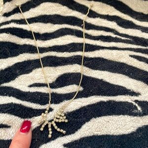 This darling necklace was a gift!    Unfortunately it has never been worn.